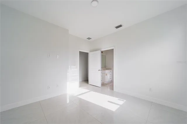 a bathroom with a toilet and a bathtub
