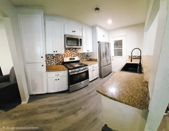 a bedroom with furniture and a flat screen tv