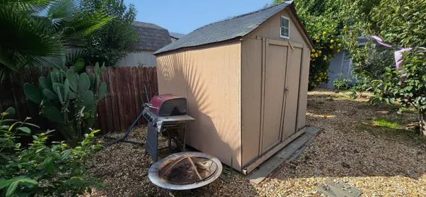 a picture of a building with yard