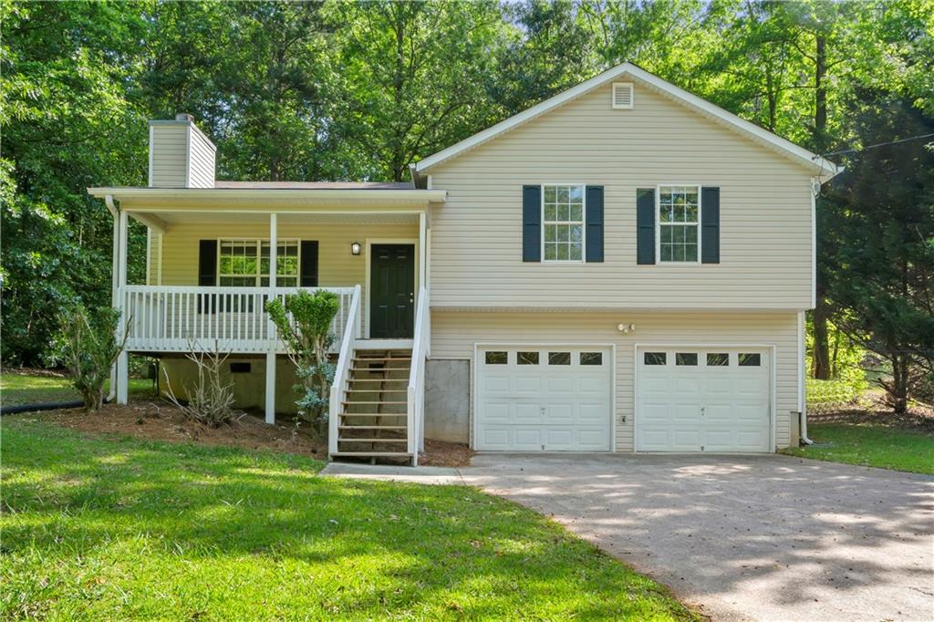 631 Waters Road Hiram, GA 30141 - Photo 1 of 1 a front view of a house with a yard