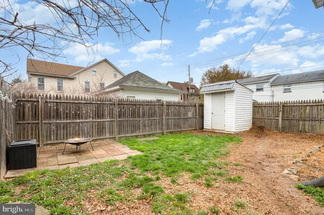 a view of a backyard with a garden