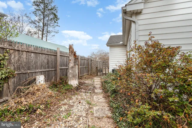 a view of a pathway of a house front of house