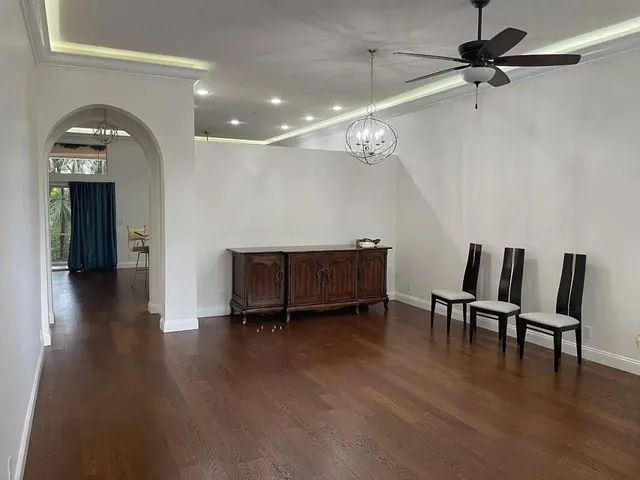 a view of a livingroom with furniture and wooden floor