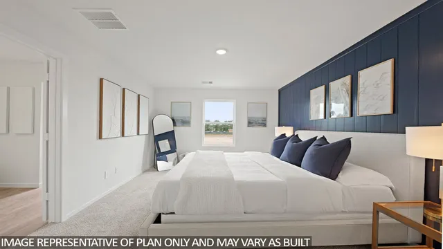 a bedroom with a bed window and wall painting