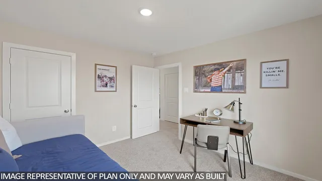 a workspace room with furniture and wooden floor