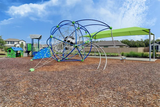 a view of a swimming pool with a garden
