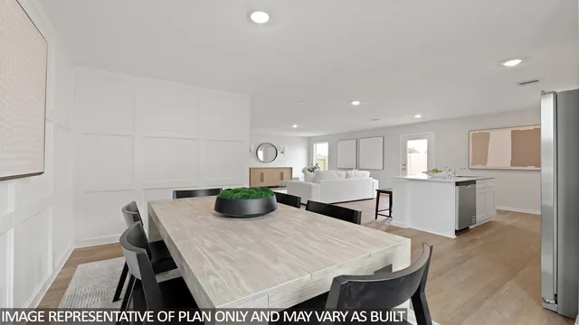 a room with a table chairs and a dining table