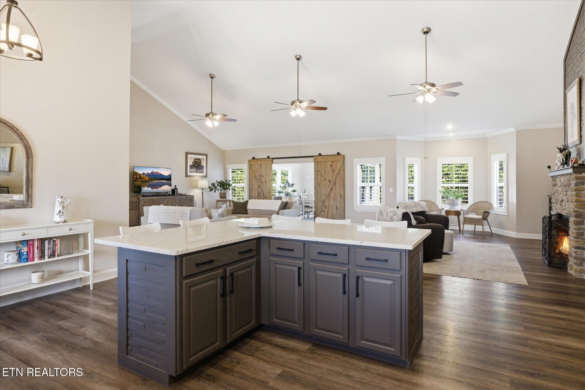 1330 Rippling Waters Circle Sevierville, TN 37876 - Photo 14 of 53 a kitchen with sink stove and cabinets