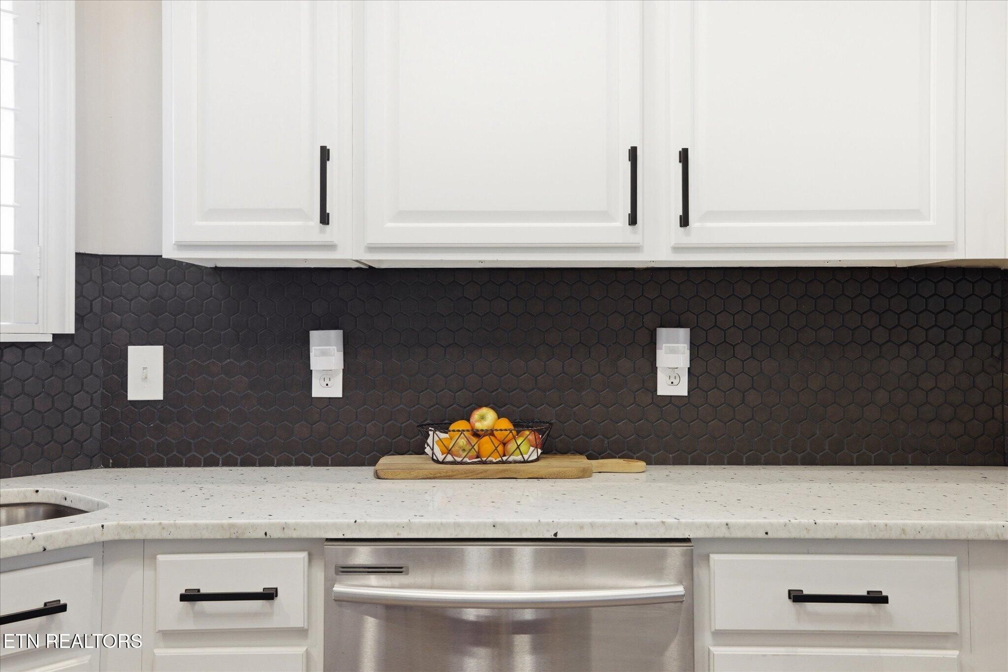 1330 Rippling Waters Circle Sevierville, TN 37876 - Photo 16 of 53 a sink with a granite counter top