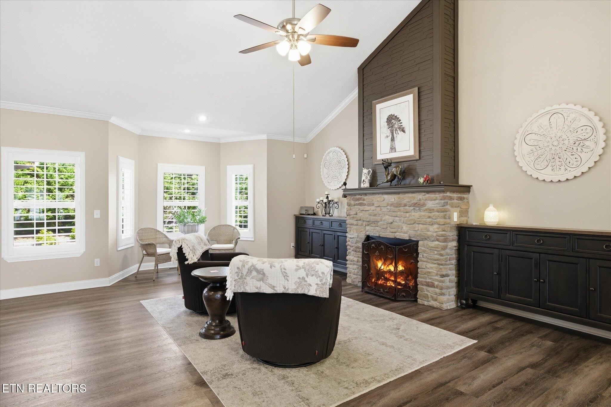 1330 Rippling Waters Circle Sevierville, TN 37876 - Photo 17 of 53 a living room with furniture and a fireplace