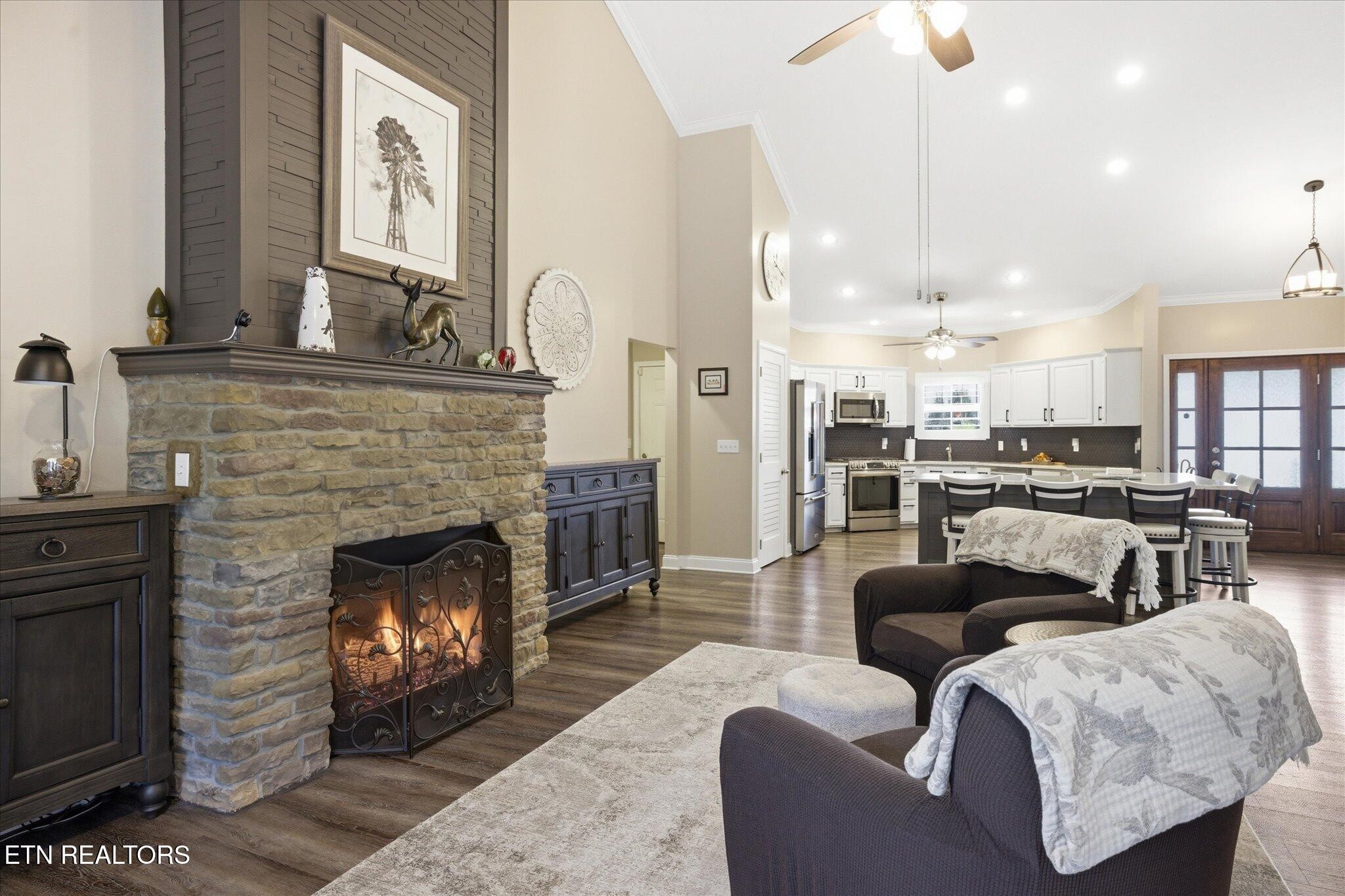 1330 Rippling Waters Circle Sevierville, TN 37876 - Photo 19 of 53 a living room with furniture and a fireplace