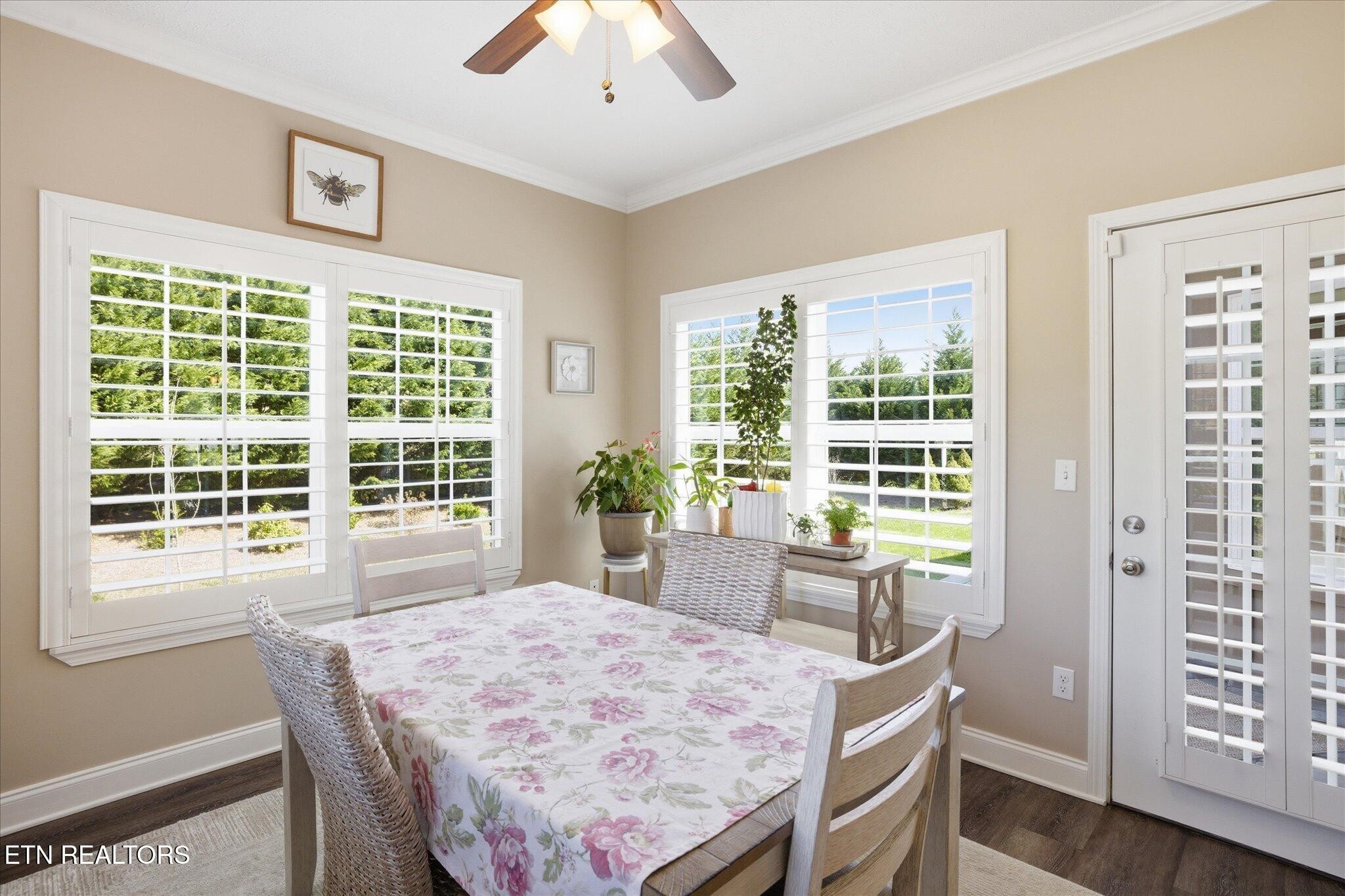 1330 Rippling Waters Circle Sevierville, TN 37876 - Photo 26 of 53 a view of a dining room with furniture window and wooden floor