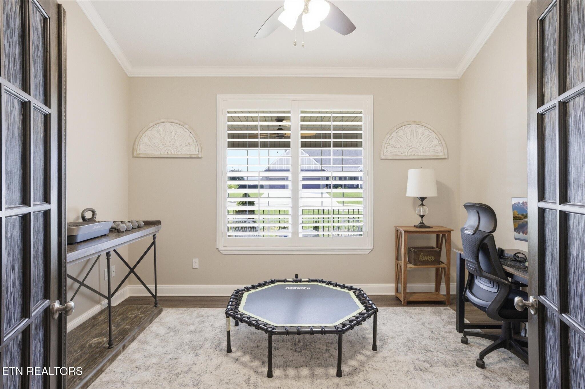 1330 Rippling Waters Circle Sevierville, TN 37876 - Photo 28 of 53 a dining room with furniture and a window