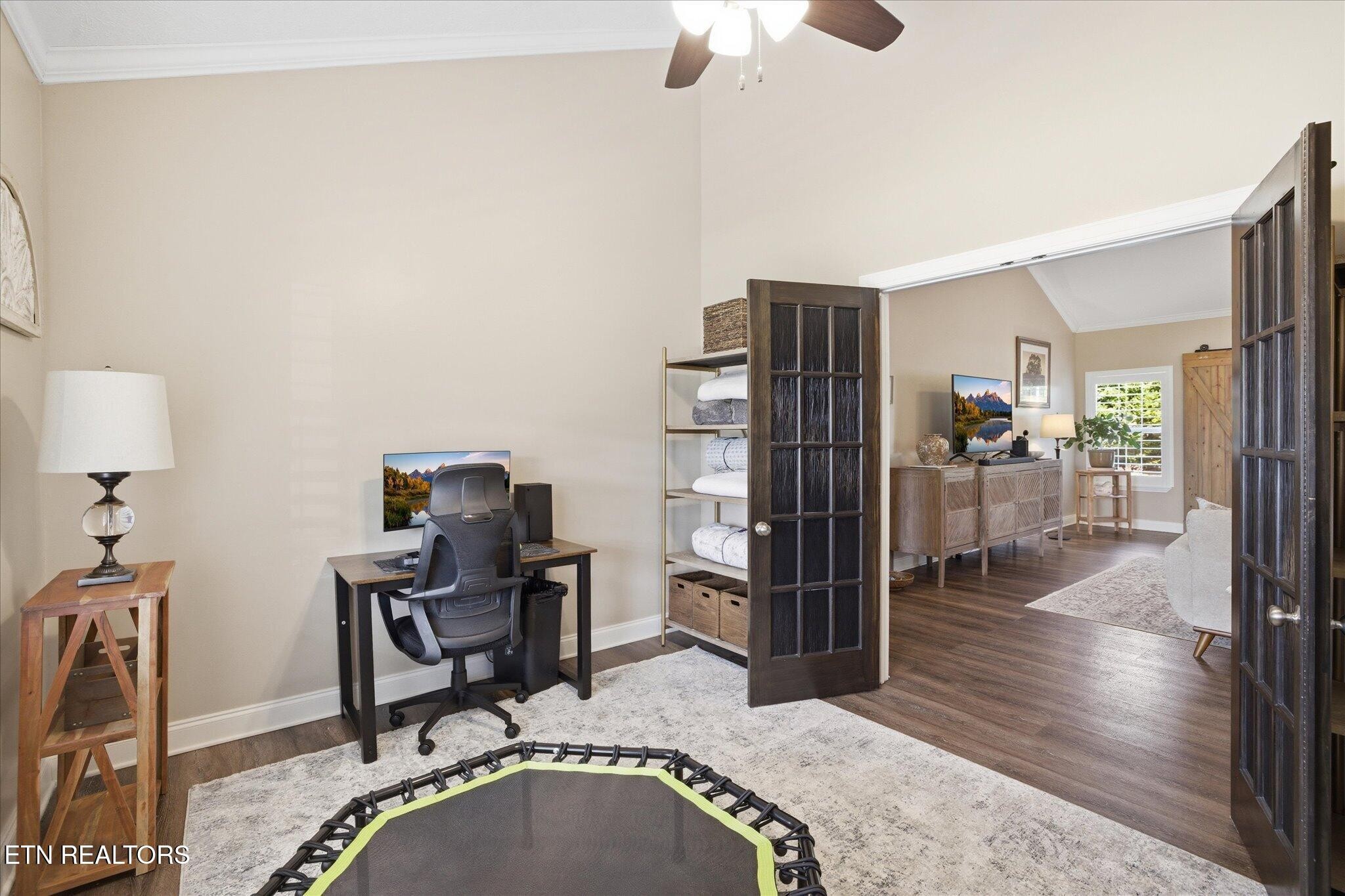 1330 Rippling Waters Circle Sevierville, TN 37876 - Photo 29 of 53 a work room with furniture and wooden floor