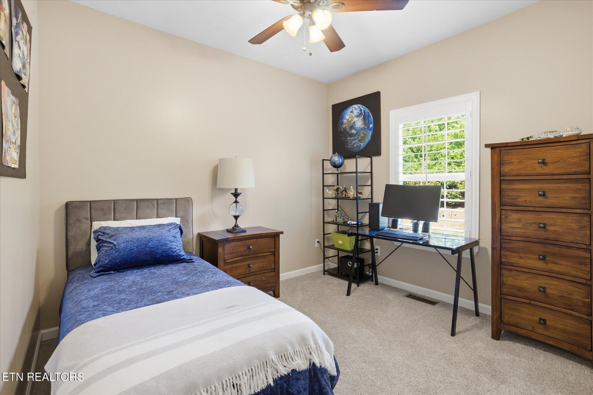 1330 Rippling Waters Circle Sevierville, TN 37876 - Photo 36 of 53 a bedroom with a bed and furniture