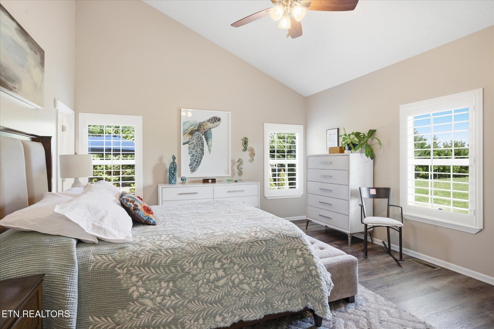 1330 Rippling Waters Circle Sevierville, TN 37876 - Photo 41 of 53 a bedroom with a bed and a large window