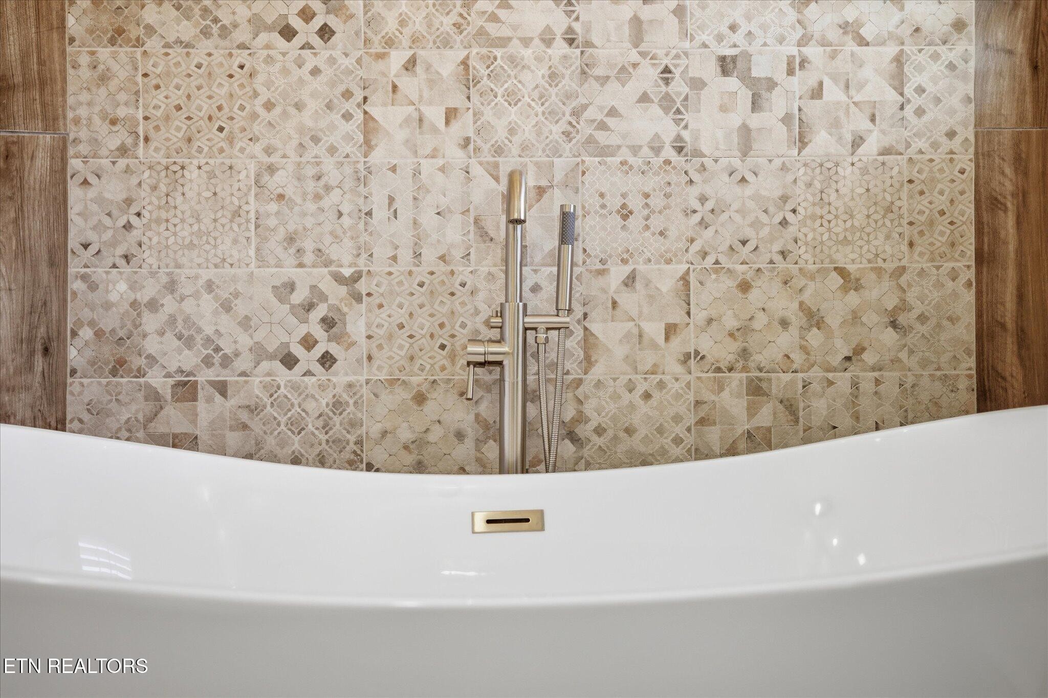 1330 Rippling Waters Circle Sevierville, TN 37876 - Photo 47 of 53 a view of a bathtub in a bathroom