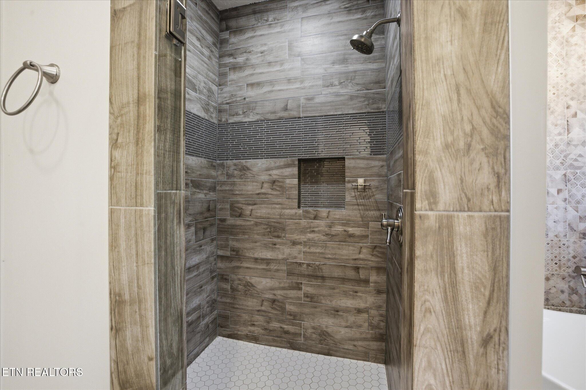 1330 Rippling Waters Circle Sevierville, TN 37876 - Photo 48 of 53 a bathroom with a shower