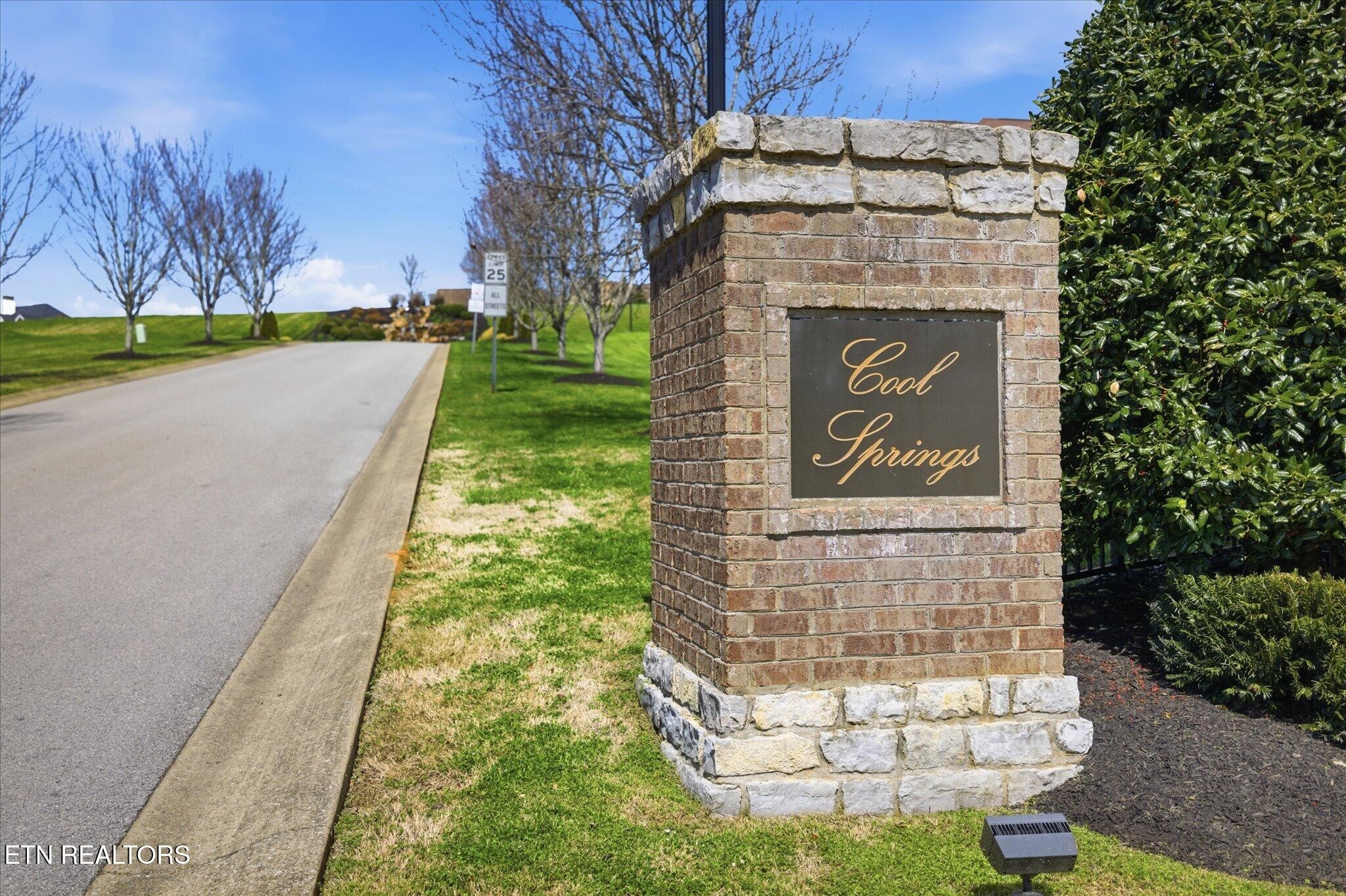 1330 Rippling Waters Circle Sevierville, TN 37876 - Photo 50 of 53 a sign on the side of a building