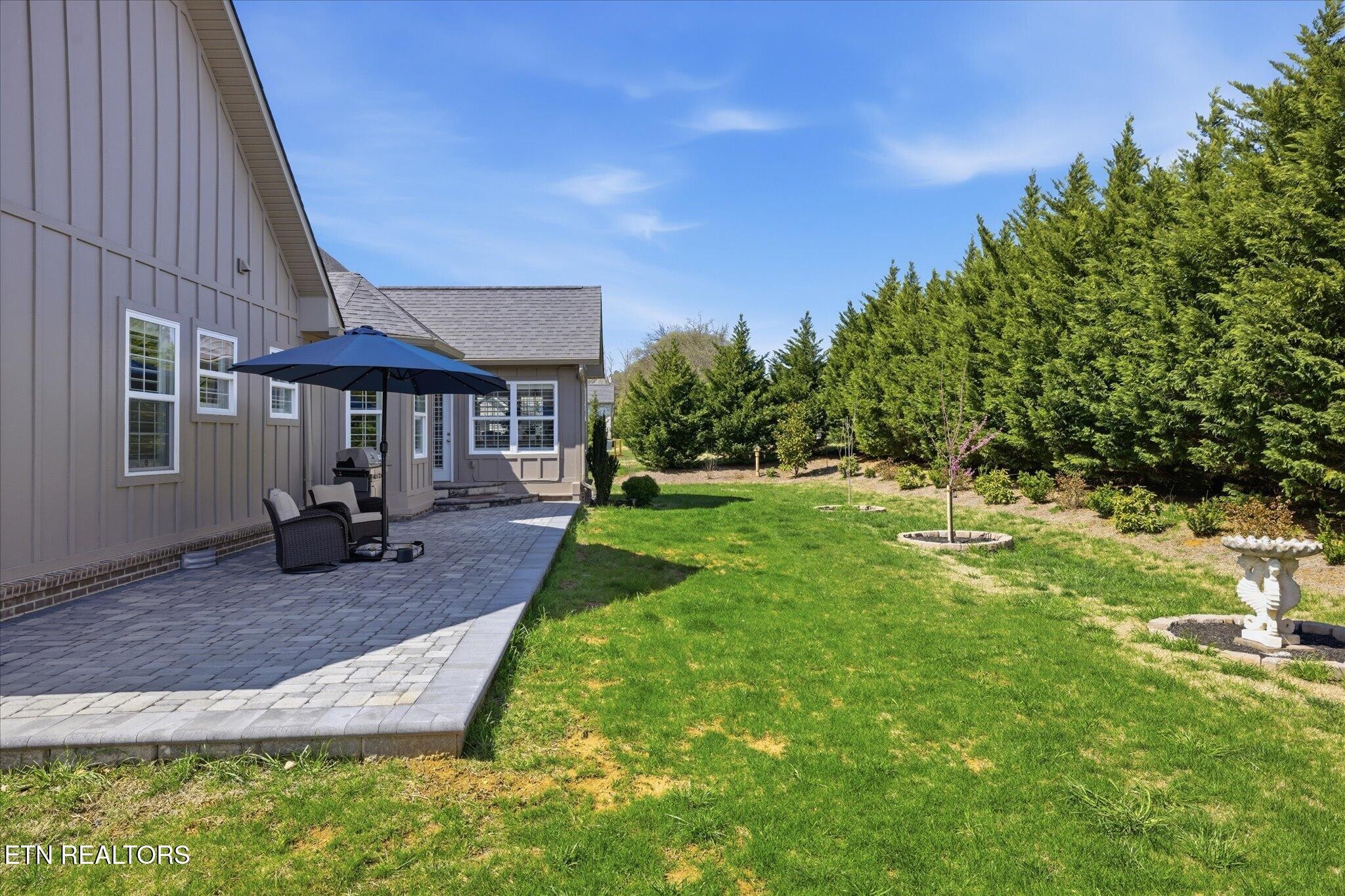 1330 Rippling Waters Circle Sevierville, TN 37876 - Photo 5 of 53 a front view of a house with garden