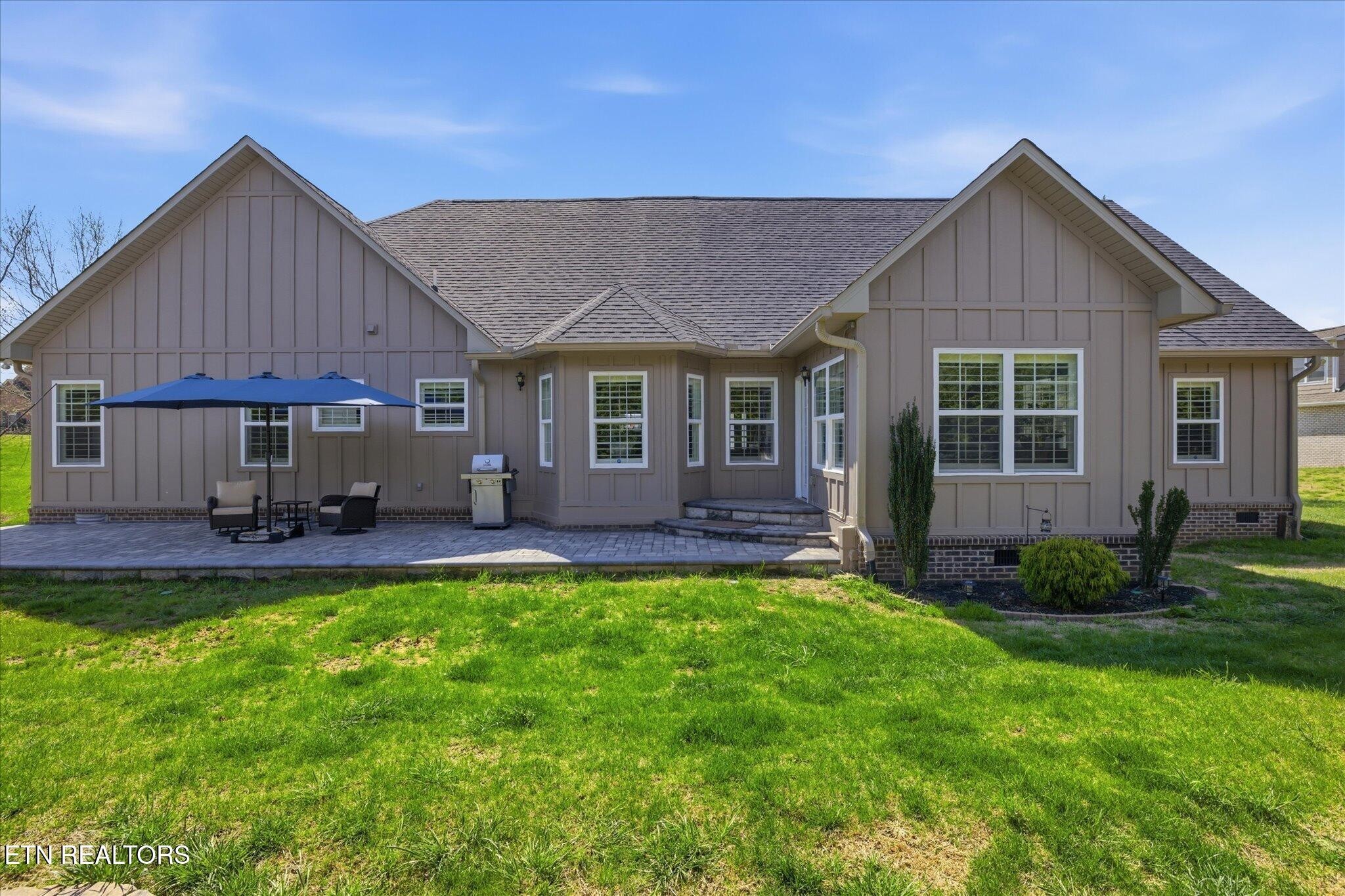 1330 Rippling Waters Circle Sevierville, TN 37876 - Photo 6 of 53 a view of a house with a yard and sitting area