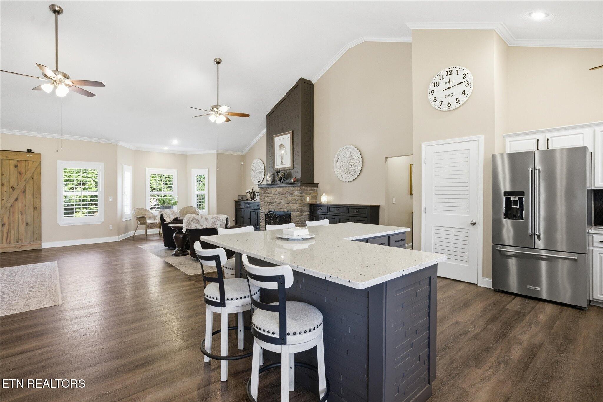 1330 Rippling Waters Circle Sevierville, TN 37876 - Photo 9 of 53 a large kitchen with a table and chairs