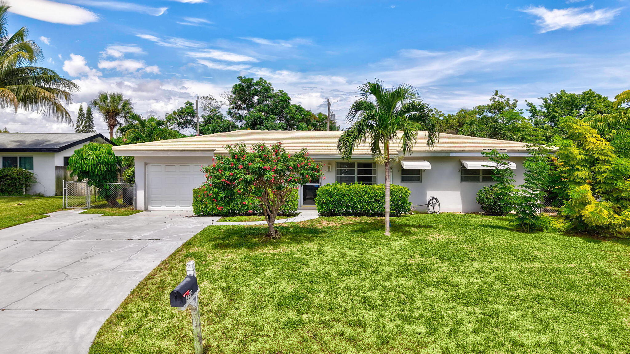 469 Northeast 35th Street Boca Raton, FL 33431 - Photo 2 of 63 2-web-or-mls-DJI_20260908133336_0211_DAn