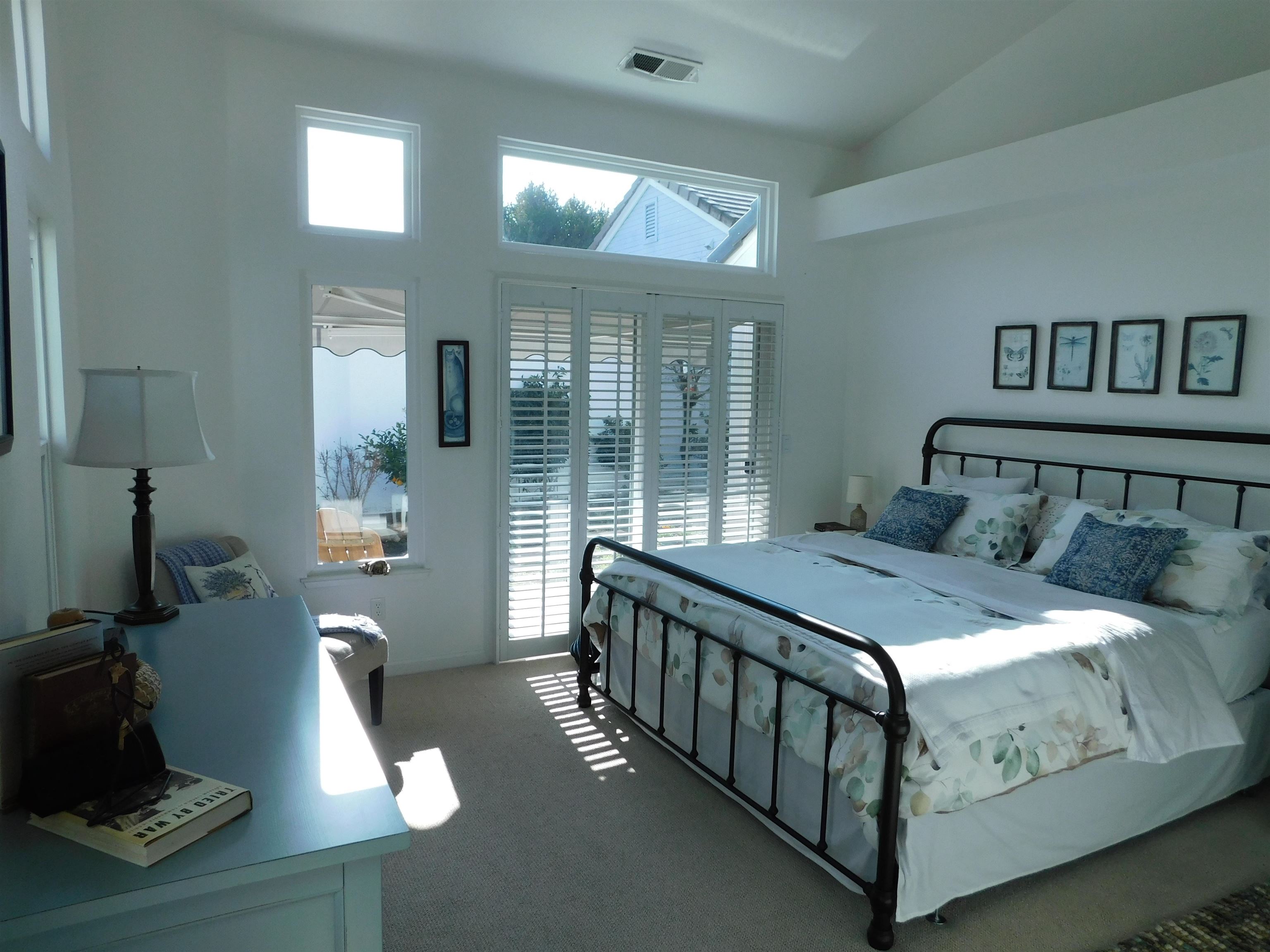 1169 Copper Cottage Lane Modesto, CA 95355 - Photo 19 of 42 a bedroom with a bed and a night stand