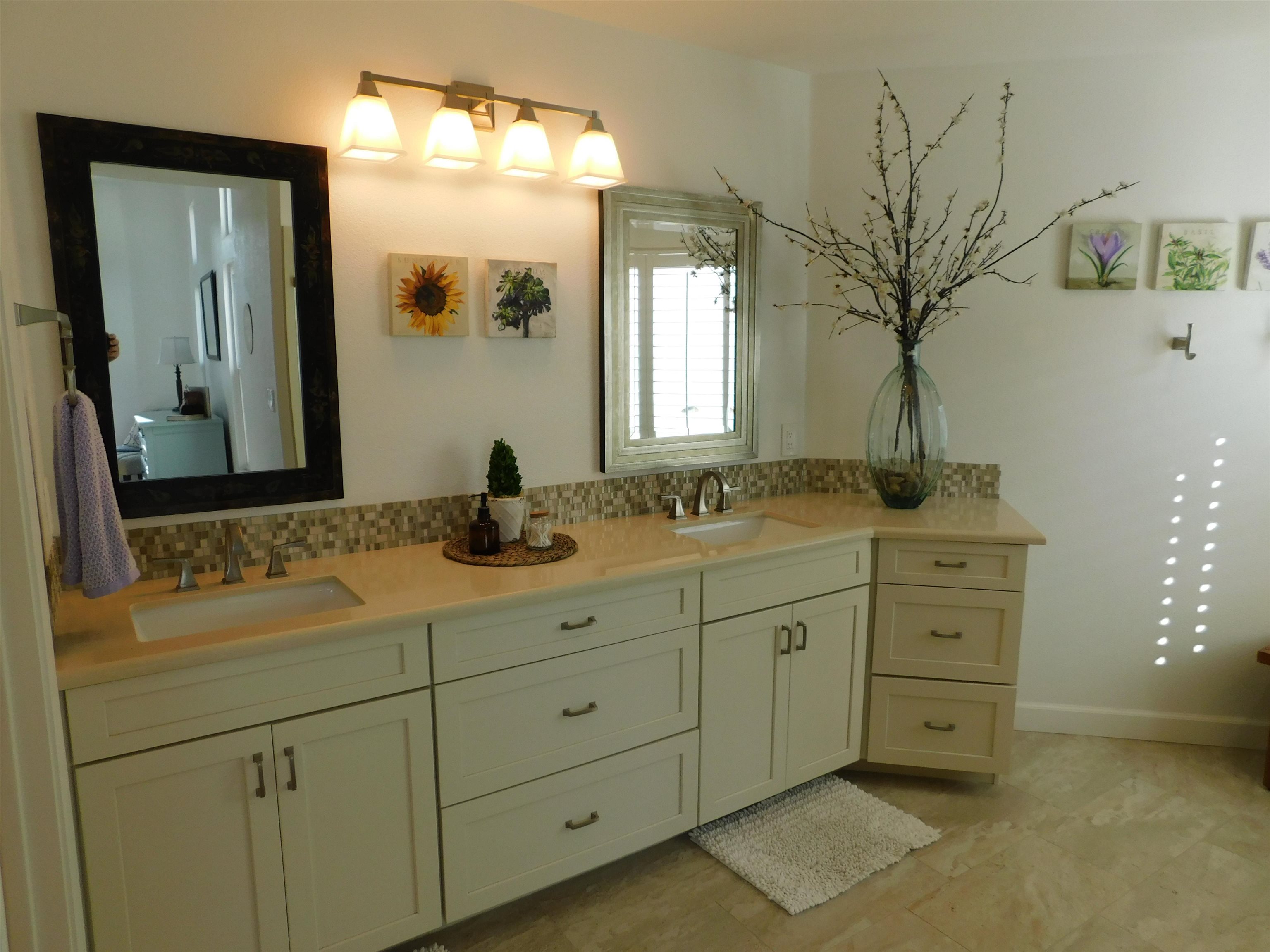 1169 Copper Cottage Lane Modesto, CA 95355 - Photo 22 of 42 a bathroom with a sink and a mirror