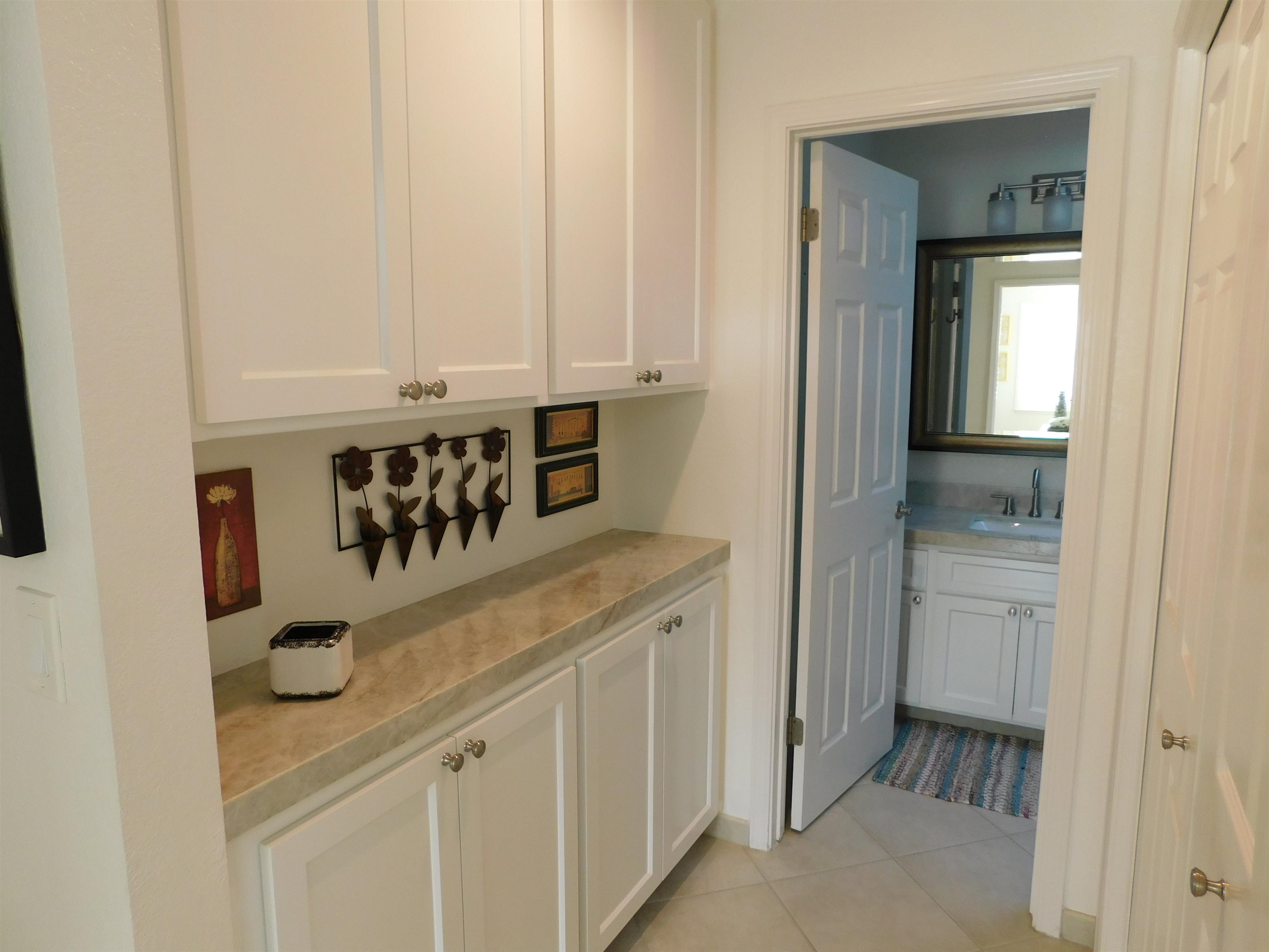 1169 Copper Cottage Lane Modesto, CA 95355 - Photo 25 of 42 a view of kitchen with cabinets and window