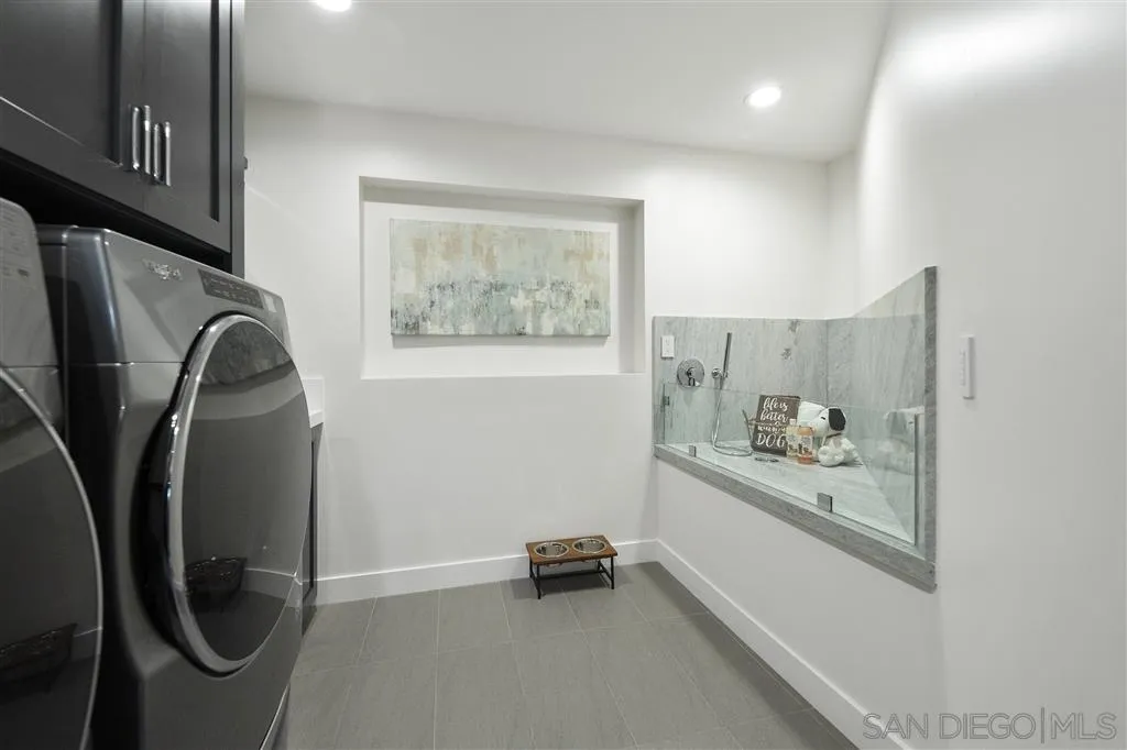 5780 Rutgers Road La Jolla, CA 92037 - Photo 23 of 25 a view of hallway with washer and dryer