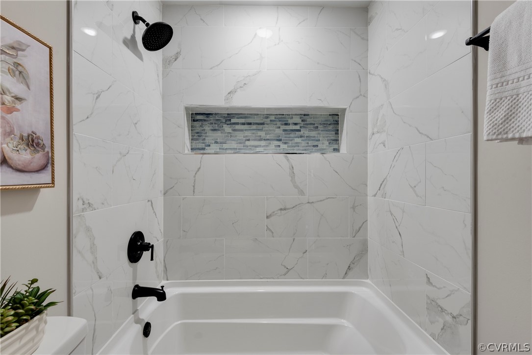 1114 Covington Road Colonial Heights, VA 23834 - Photo 19 of 47 a bathroom with a shower and a tub