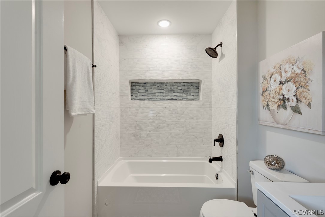1114 Covington Road Colonial Heights, VA 23834 - Photo 23 of 47 a bathroom with a shower a toilet and a bathtub