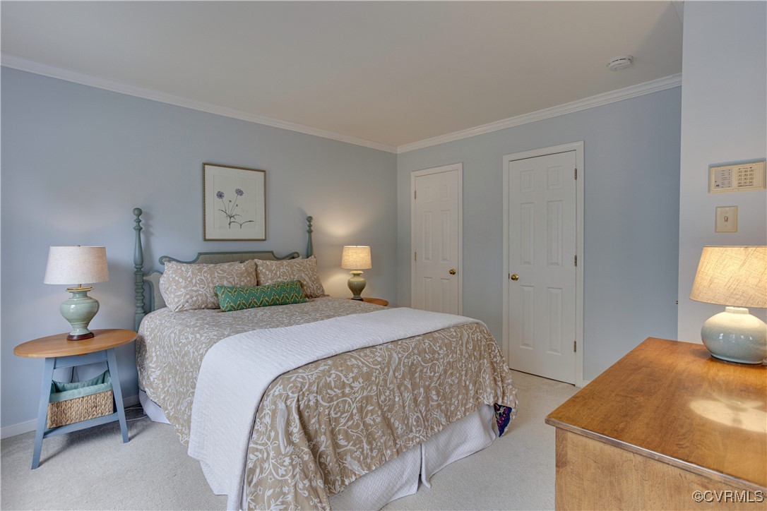 2706 Berkeley Pointe Drive Henrico, VA 23233 - Photo 26 of 48 a bedroom with a bed and a lamp