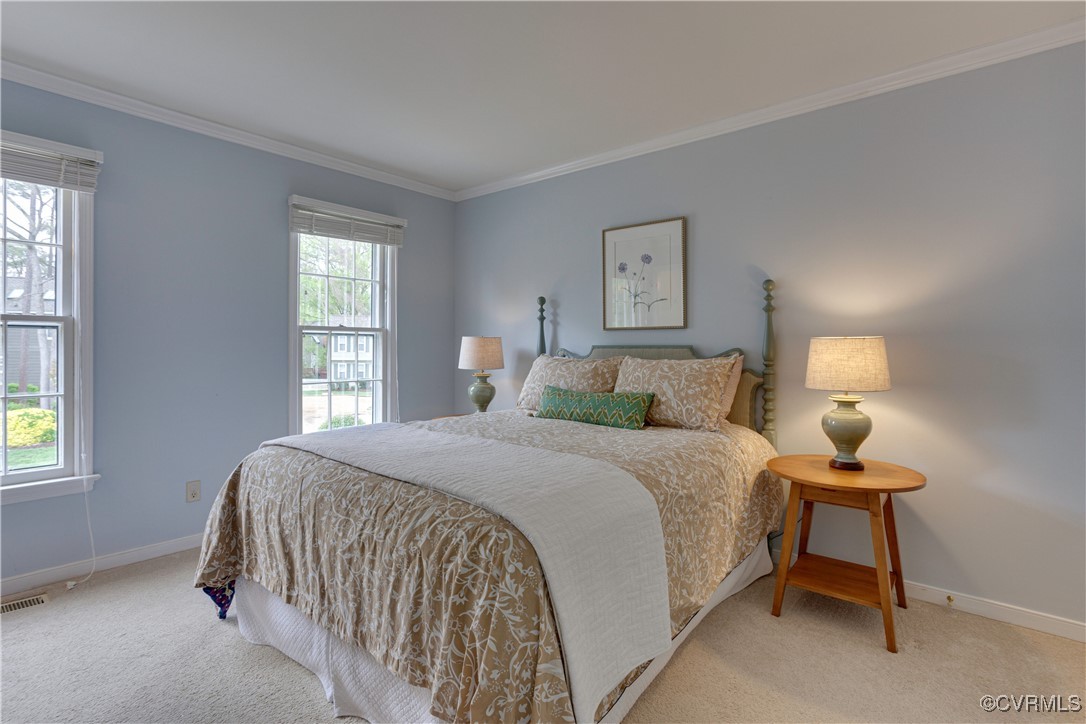 2706 Berkeley Pointe Drive Henrico, VA 23233 - Photo 27 of 48 a bedroom with a bed and a window