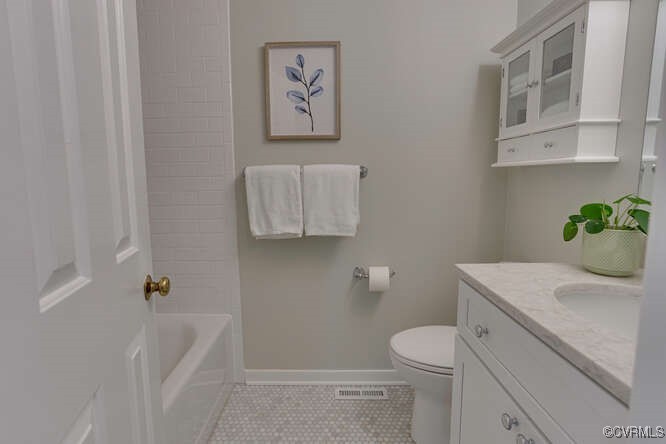 2706 Berkeley Pointe Drive Henrico, VA 23233 - Photo 41 of 48 a bathroom with a sink a toilet and vanity