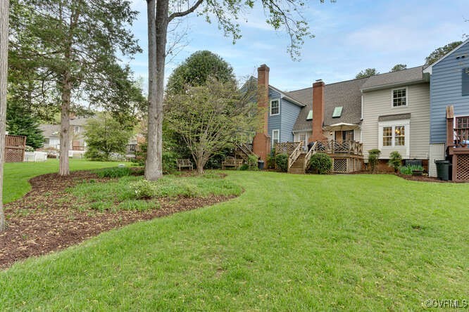 2706 Berkeley Pointe Drive Henrico, VA 23233 - Photo 44 of 48 a view of a yard in front of a house