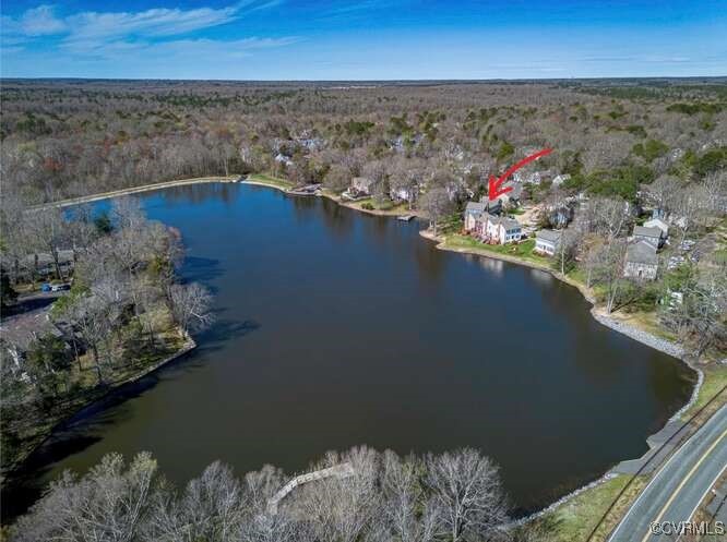 2706 Berkeley Pointe Drive Henrico, VA 23233 - Photo 46 of 48 a view of a lake with a mountain