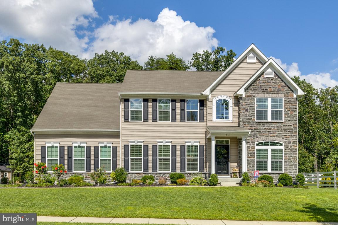 913 Gladway Road Baltimore, MD 21220 - Photo 1 of 30 front view of a house with a yard
