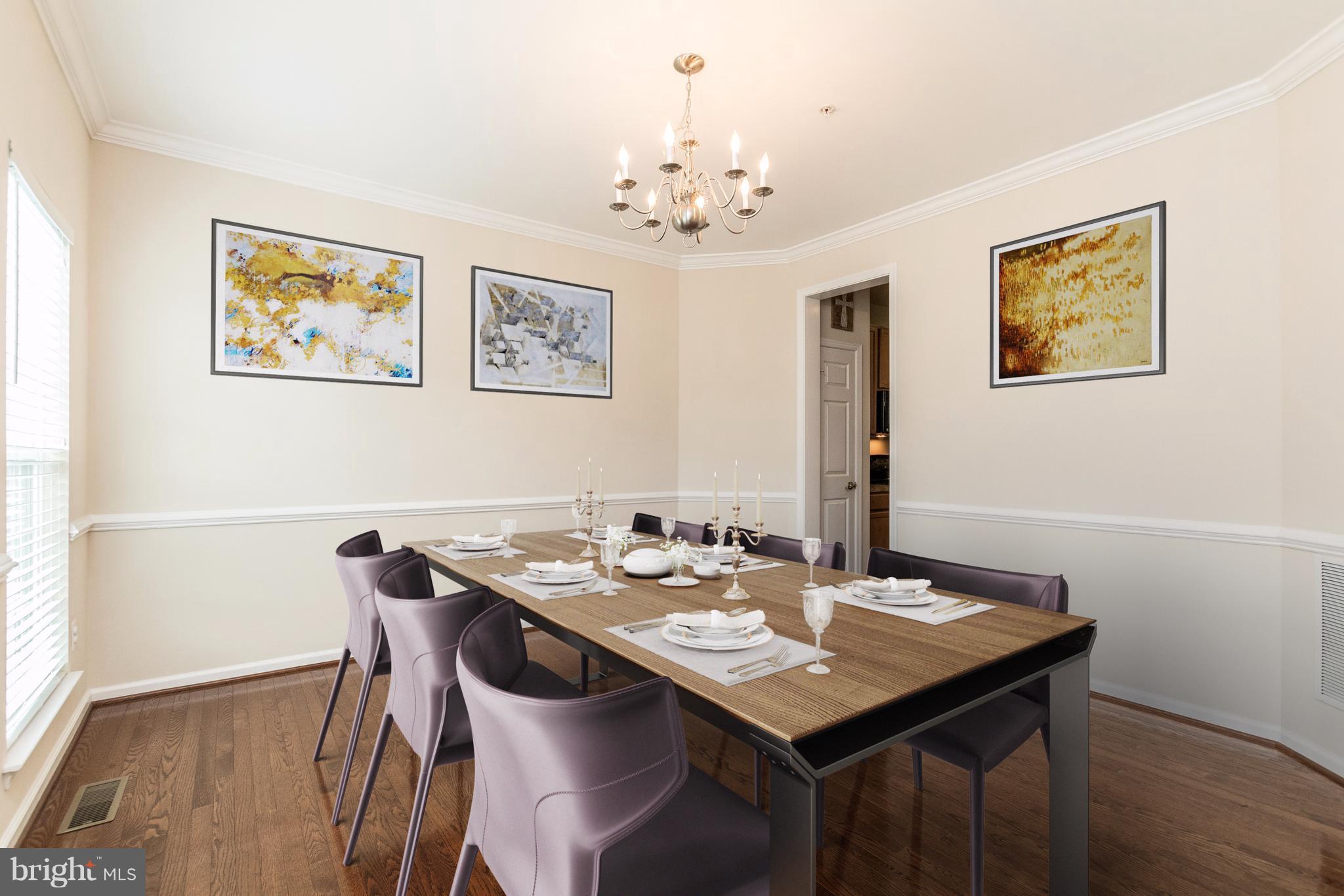 913 Gladway Road Baltimore, MD 21220 - Photo 4 of 30 a view of a dining room with furniture and wooden floor