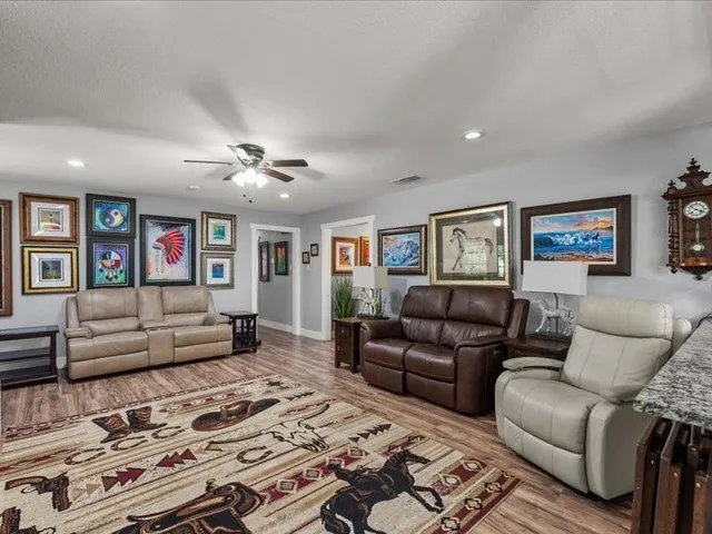 a living room with furniture and a couch