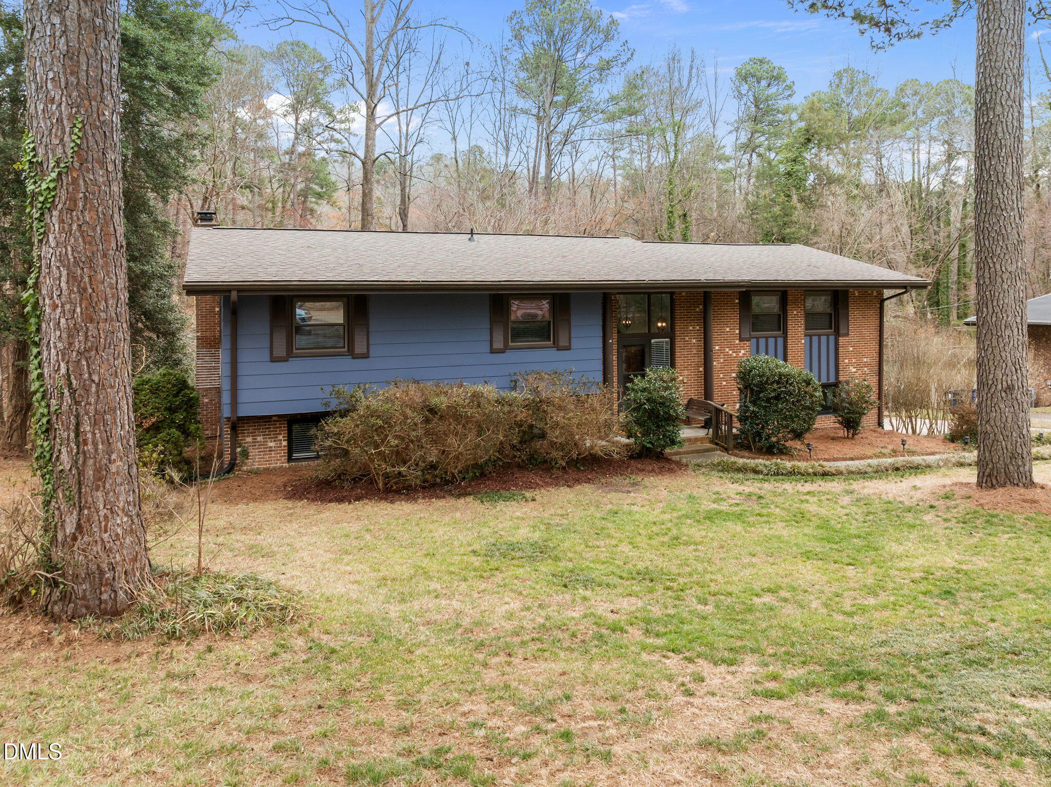 321 Brandywine Road Chapel Hill, NC 27516 - Photo 1 of 38 a front view of a house with garden