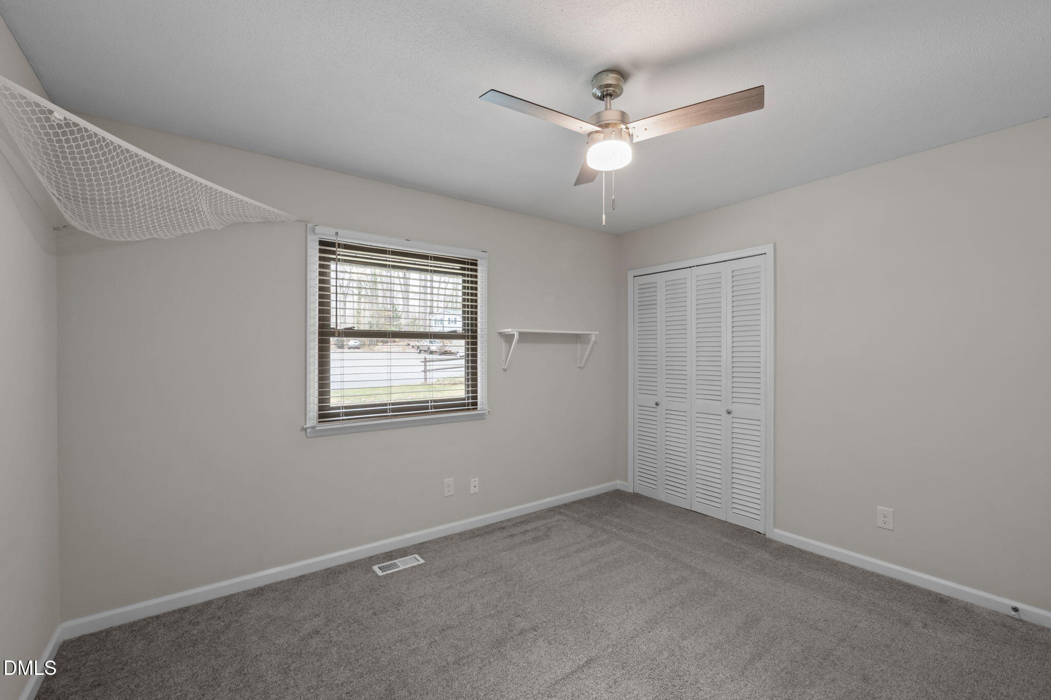 321 Brandywine Road Chapel Hill, NC 27516 - Photo 16 of 38 a view of an empty room with a window