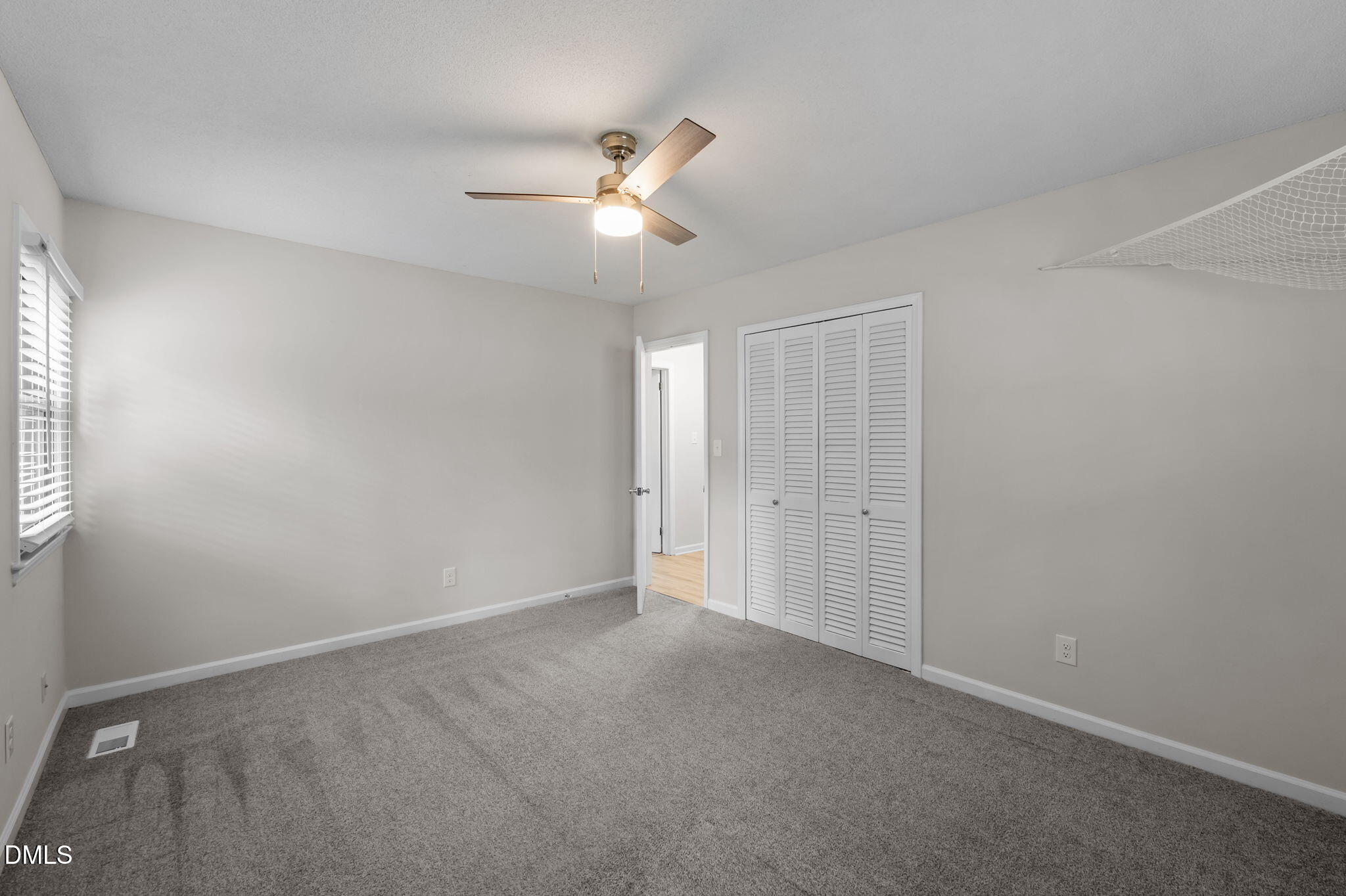 321 Brandywine Road Chapel Hill, NC 27516 - Photo 18 of 38 a view of an empty room with a window