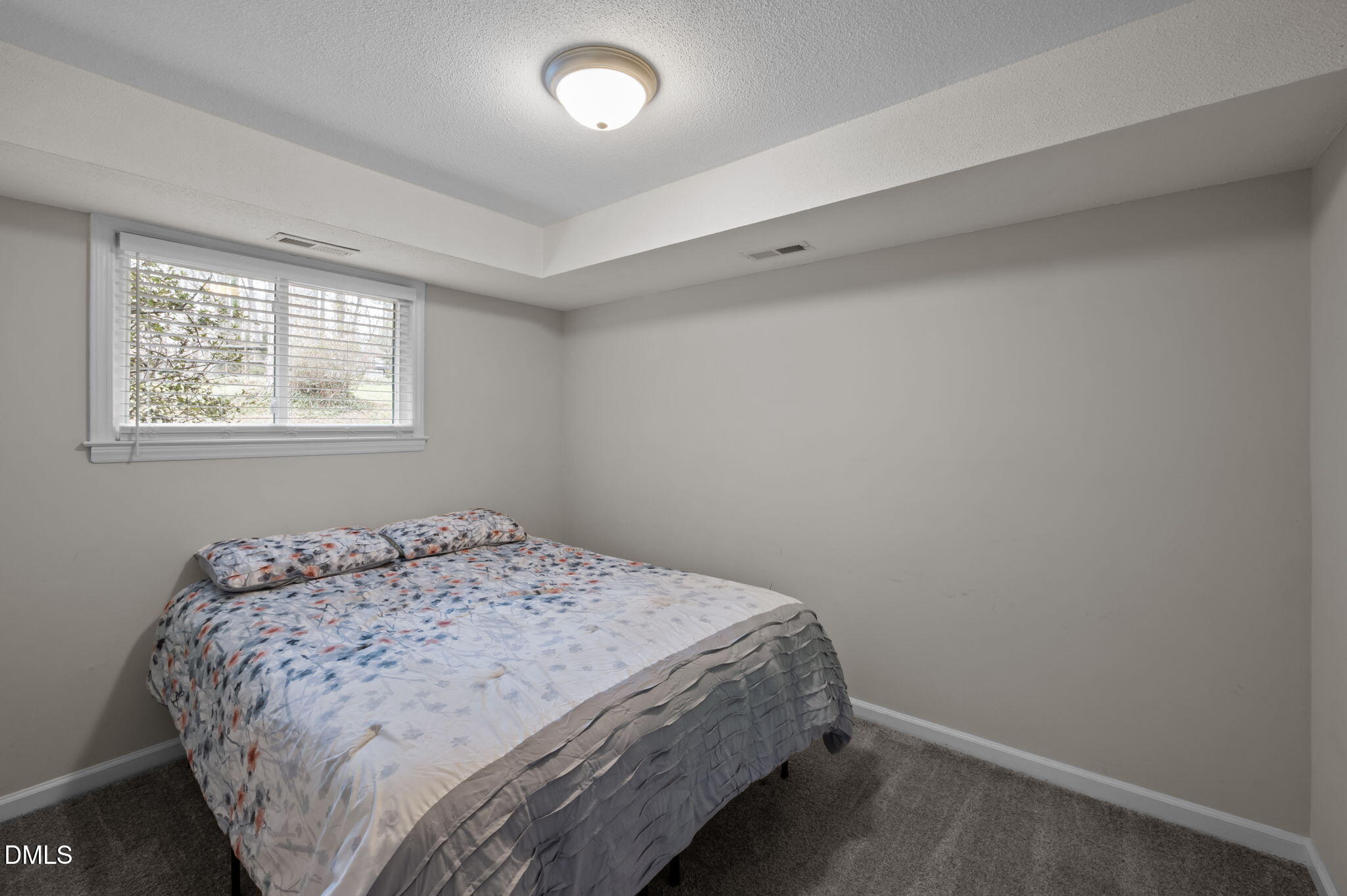 321 Brandywine Road Chapel Hill, NC 27516 - Photo 21 of 38 a bedroom with a bed and a window