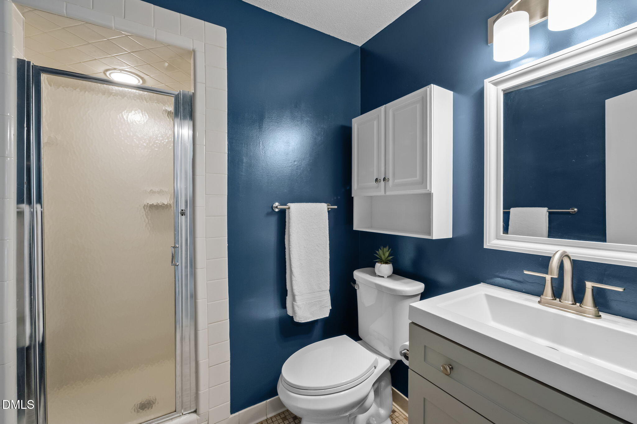 321 Brandywine Road Chapel Hill, NC 27516 - Photo 22 of 38 a bathroom with a sink toilet and shower