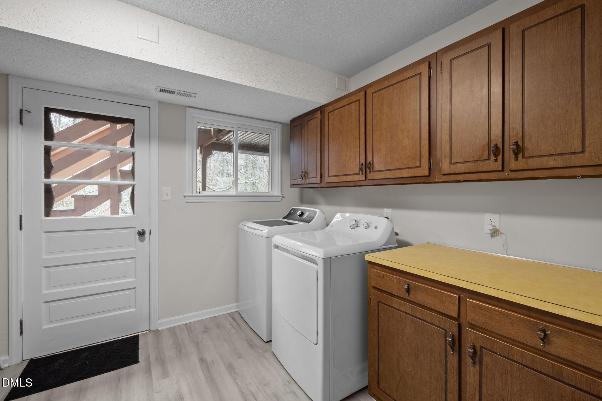 321 Brandywine Road Chapel Hill, NC 27516 - Photo 23 of 38 a utility room with sink dryer and washer