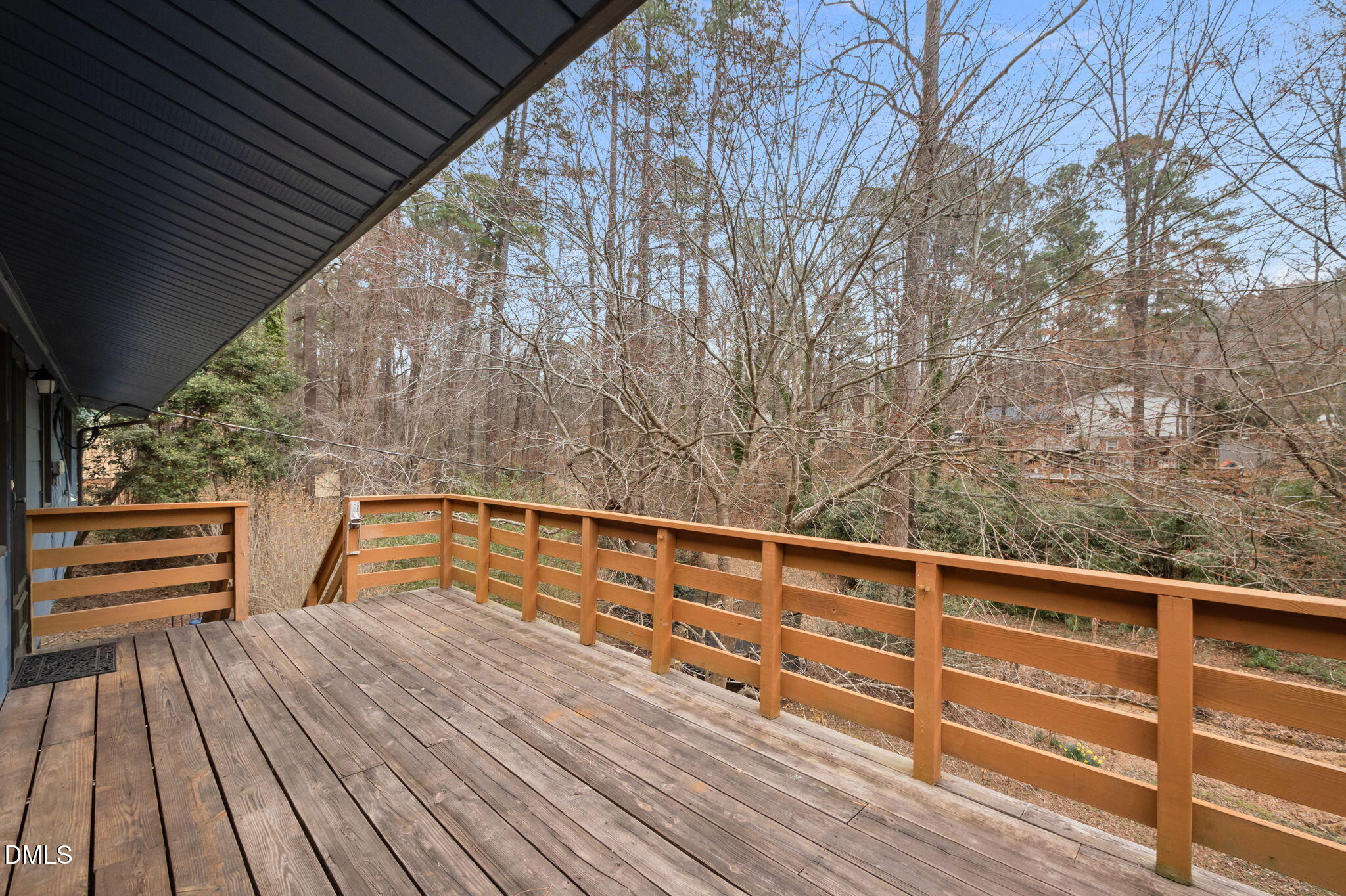 321 Brandywine Road Chapel Hill, NC 27516 - Photo 28 of 38 a view of a balcony with wooden floor and iron fence