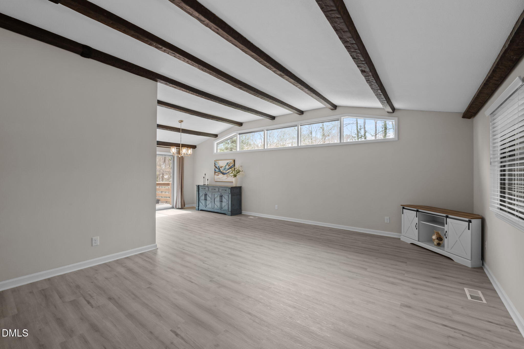 321 Brandywine Road Chapel Hill, NC 27516 - Photo 5 of 38 a view of empty room with wooden floor