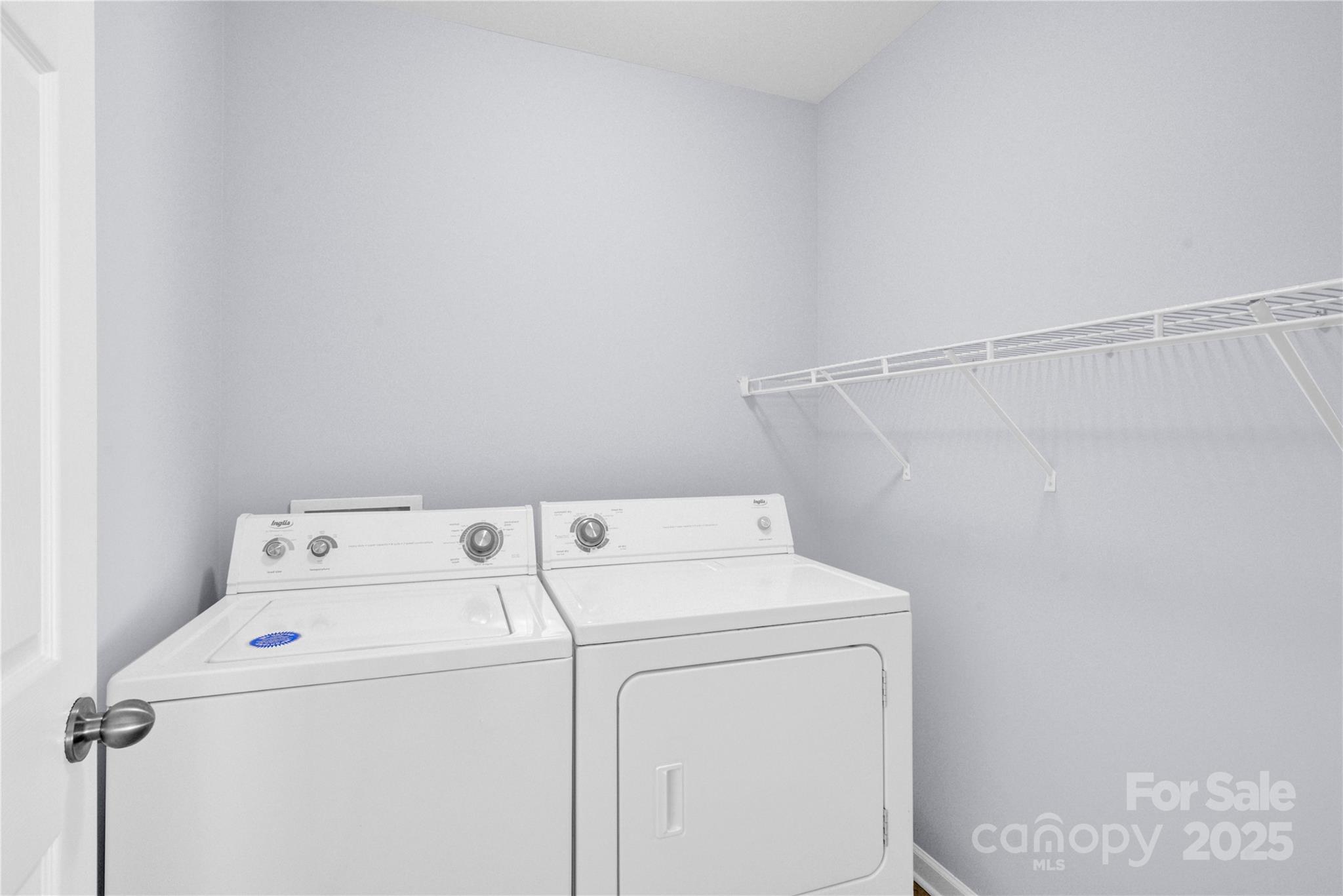 12418 Downy Birch Road Charlotte, NC 28227 - Photo 22 of 37 a utility room with dryer and washer